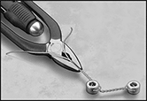 Image of ProductInUse. Front orientation. Contains Border. Wire-Twisting Pliers. Wire-Twisting Pliers.
