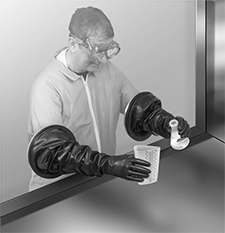 Image of ProductInUse. Front orientation. Gloves. One-Piece Glove Box Gloves.