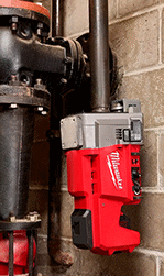 Image of ProductInUse. Shown in Use. Front orientation. Pipe Groovers. Cordless Forming Pipe Groovers.