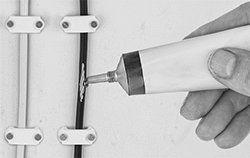 Image of ProductInUse. Front orientation. Electrical Tape. Liquid Electrical Tape.