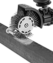 Image of ProductInUse. Shown in Use. Front orientation. Wire Bristle Blasters. Air-Powered Wire Bristle Blasters.