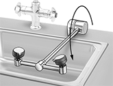 Image of ProductInUse. Front orientation. Contains Annotated. Eye Wash Stations. ANSI-Compliant Sink-Mount Eye Wash Stations with Pipe Connection, Swing-Down Activation.
